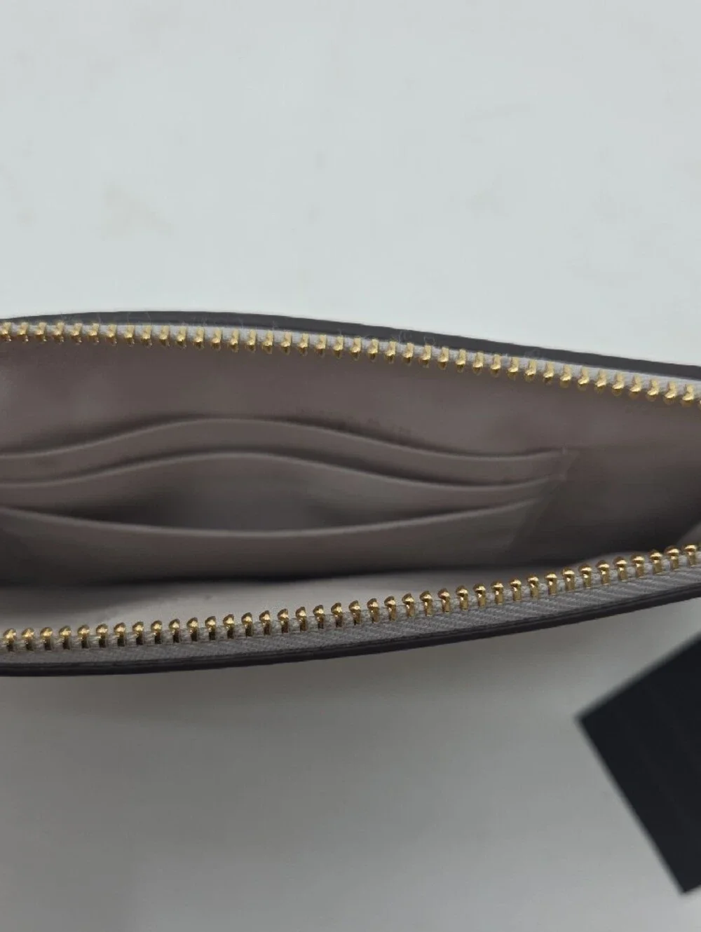 kate spade Metallic Silver Zip Wristlet